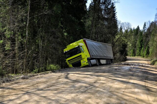 A truck crashed on a forest road.